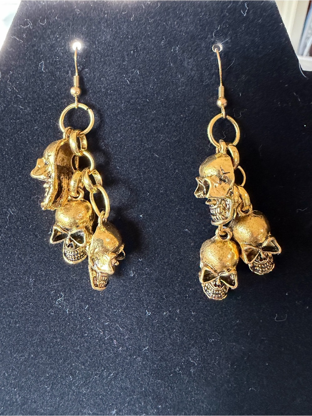 Skull drop earrings